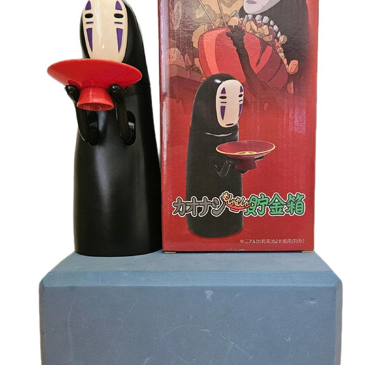 No Face Coin Bank